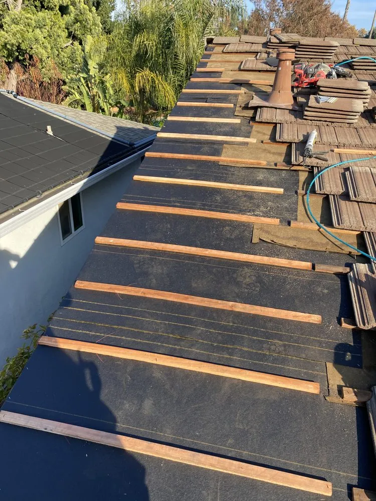 Slide of Kora Roofing