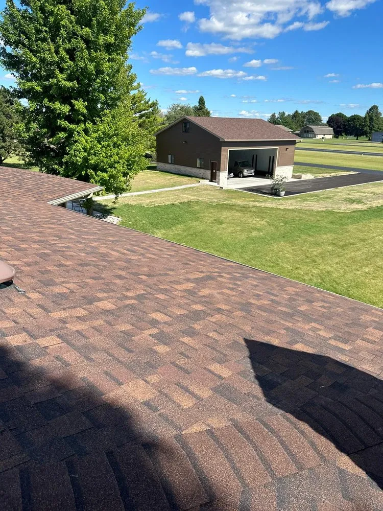 Slide of Koster Roofing