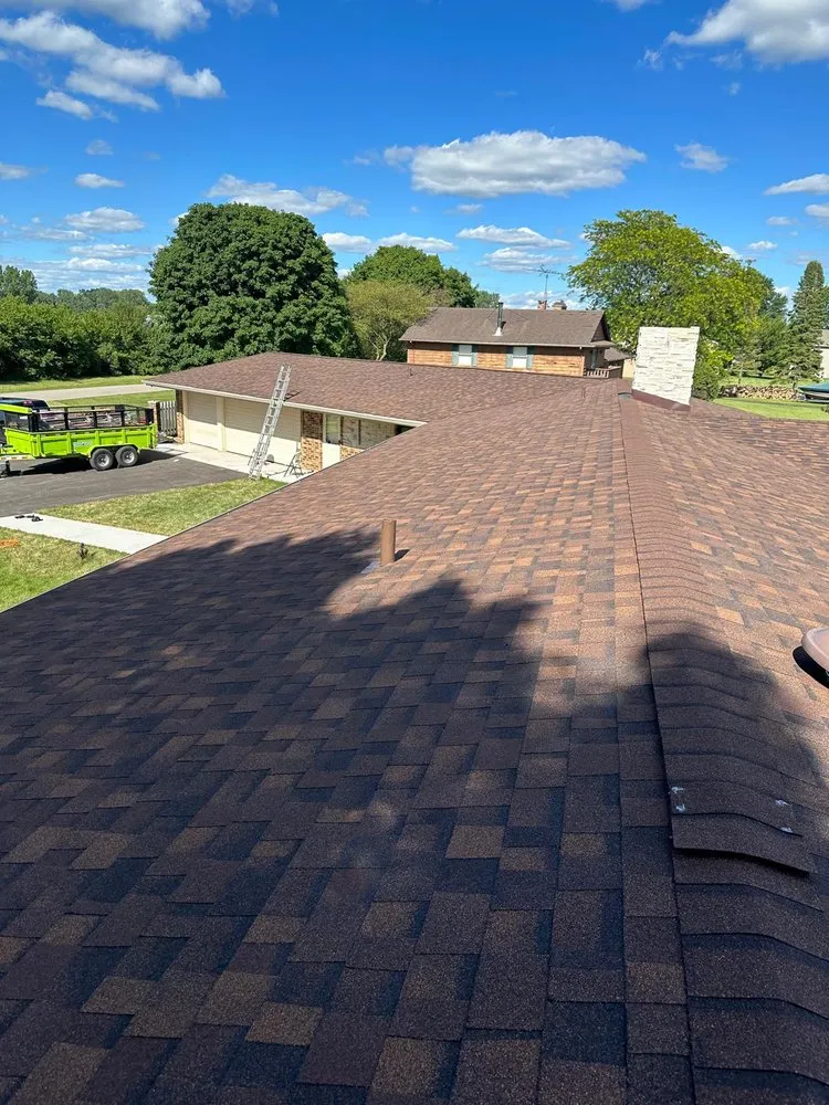 Slide of Koster Roofing