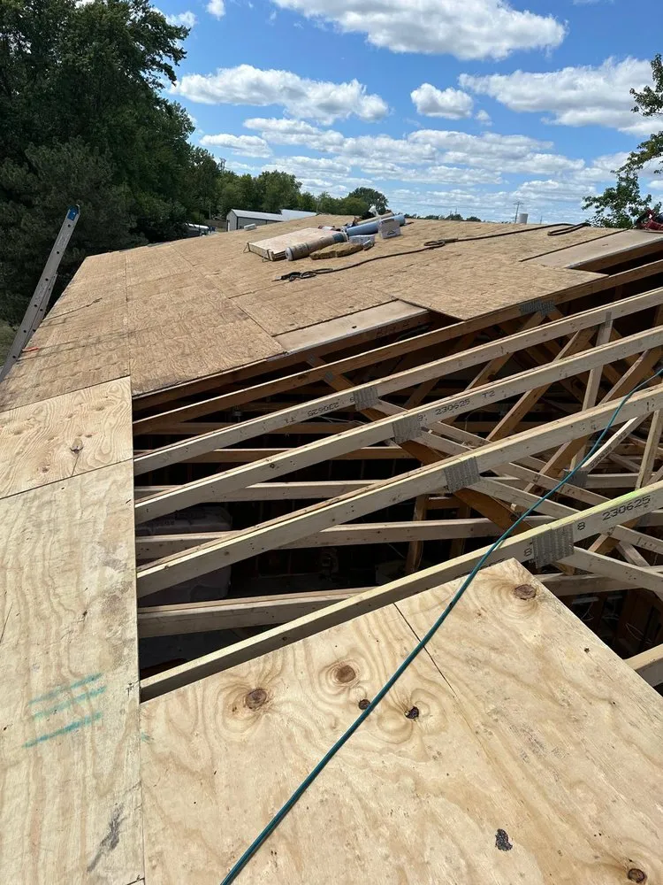 Slide of Koster Roofing