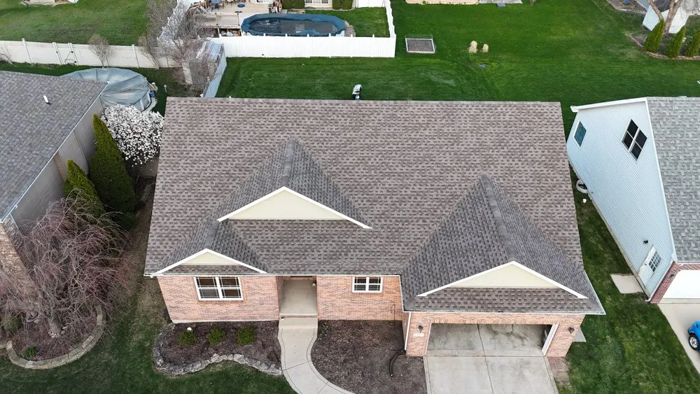 Slide of Koster Roofing