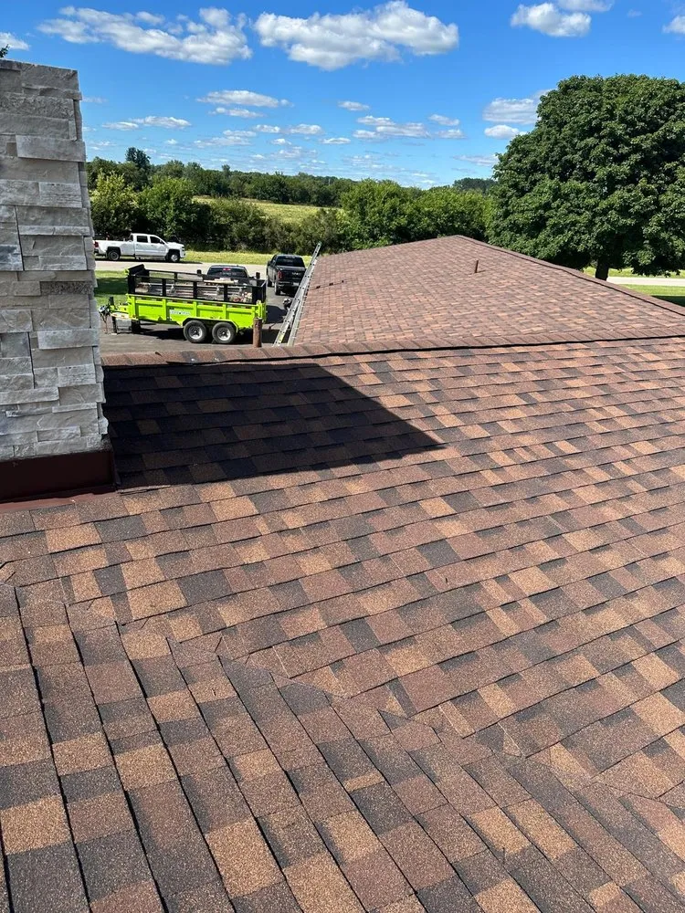 Slide of Koster Roofing