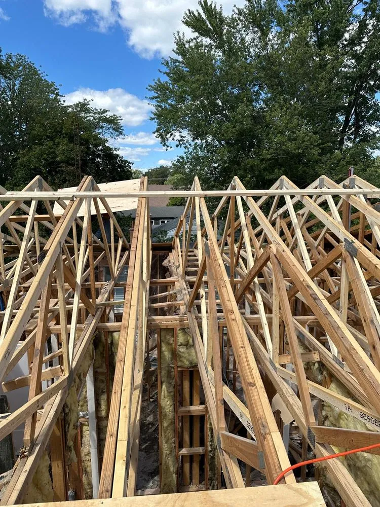 Slide of Koster Roofing