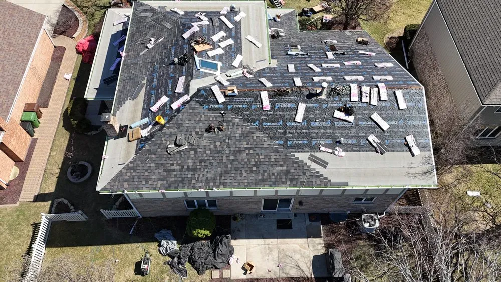 Slide of Koster Roofing