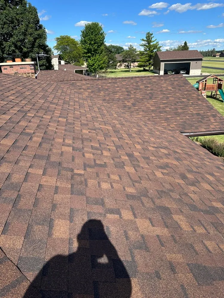 Slide of Koster Roofing