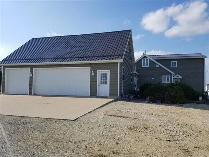 Local residential roofing service same-day service across Hazleton, IA - Kout Construction