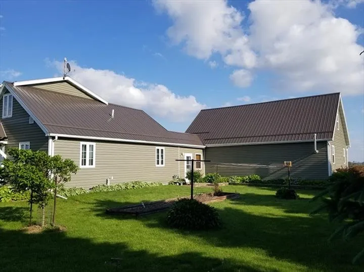 Licensed shingle roofing service in Hazleton, IA by Kout Construction