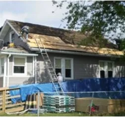 Slide of Kowalski Roofing