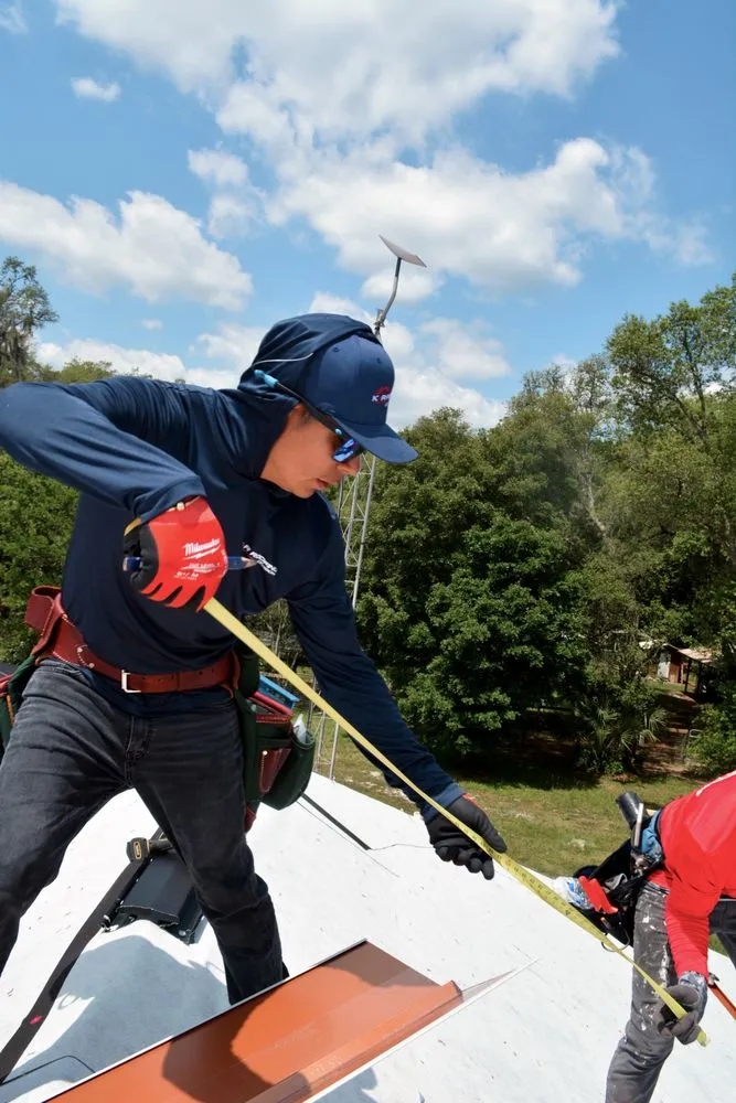 Slide of K&R Roofing Division