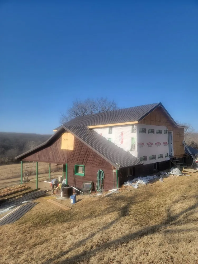 Slide of K&R ROOFING