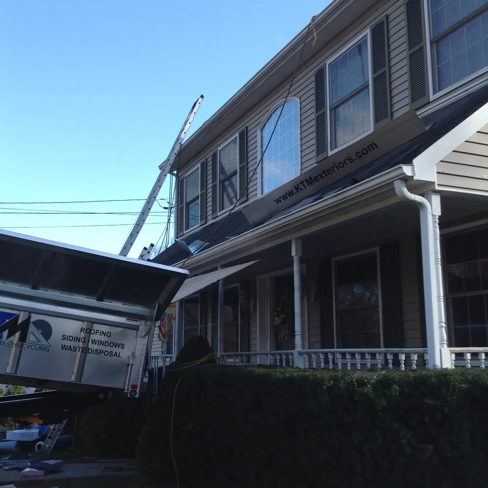 Slide of KTM Exteriors & Roofing