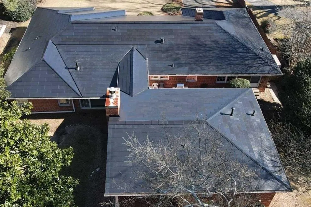 Slide of KTM Roofing