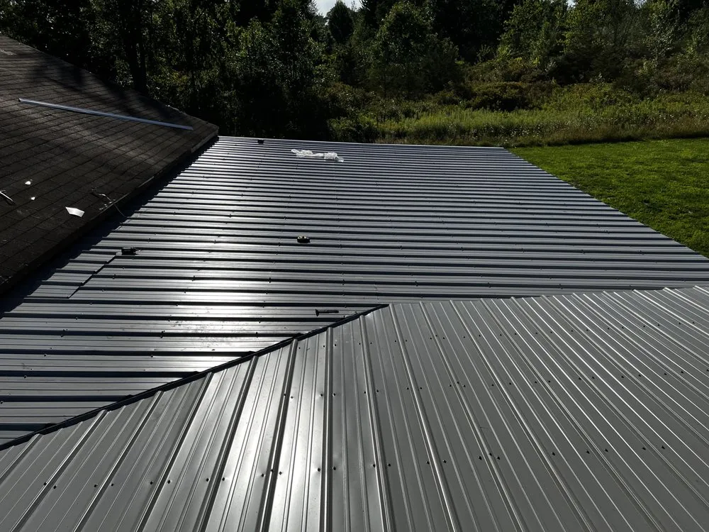 Local roof leak repair in Lawrence, MI by Kuhens Construction