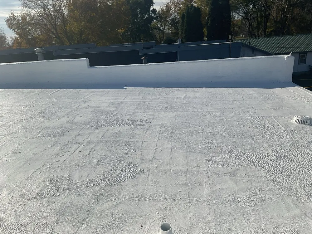 Emergency residential roofing service after storm damage in Montour, IA by Kurtz Coatings