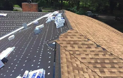 Slide of KY Roofing Plus