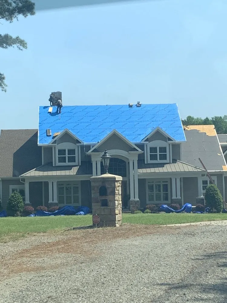 Slide of Kyles Roofwerx