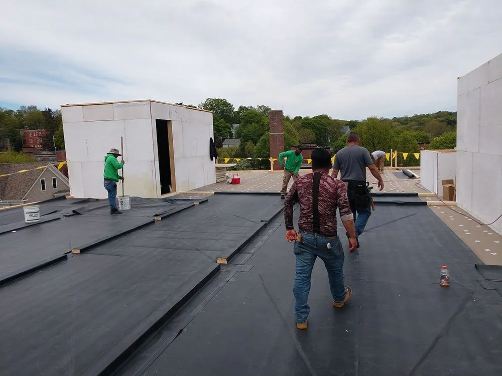 Slide of Kyne Roofing