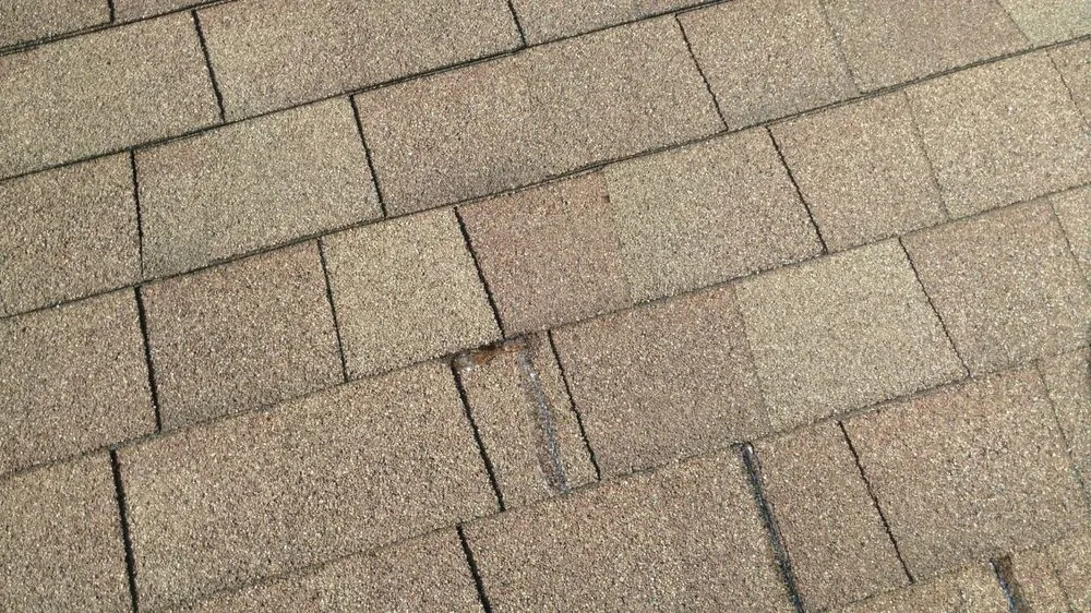 Slide of Kyne Roofing