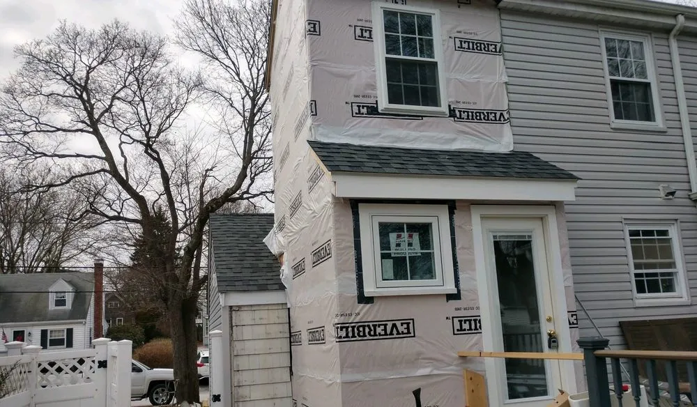 Slide of Kyne Roofing