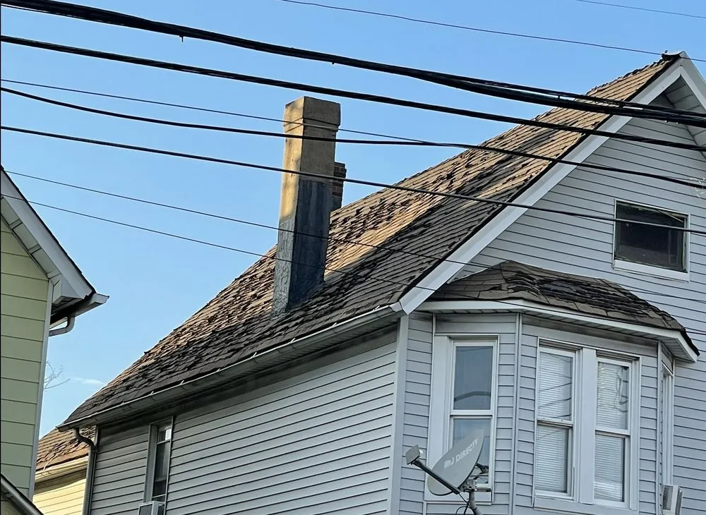 Slide of La-Bella's Roofing and Construction