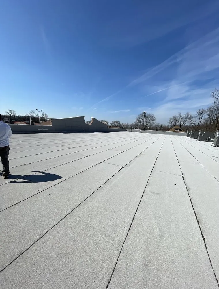 Slide of La-Bella's Roofing and Construction