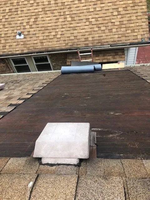 Slide of La Roca Roofing Service & Maintenance