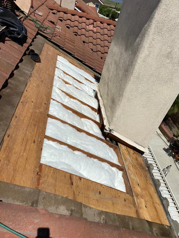 Slide of LA Roof Masters