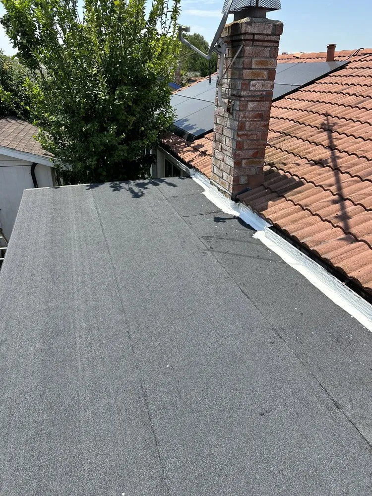 Slide of LAAC Roofing Services
