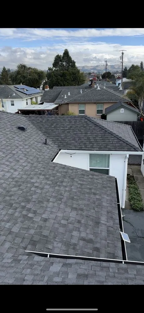 Slide of LAAC Roofing Services