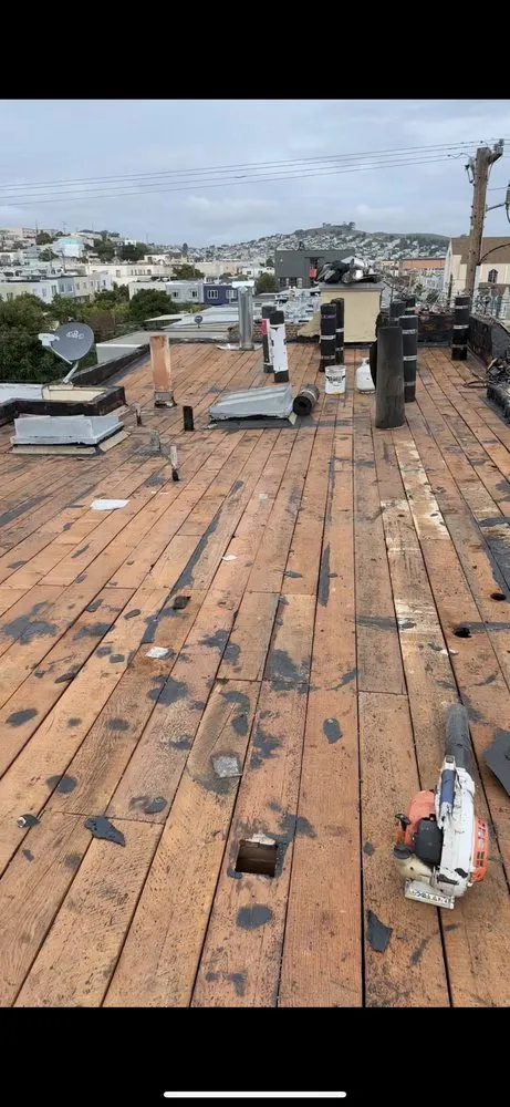 Slide of LAAC Roofing Services