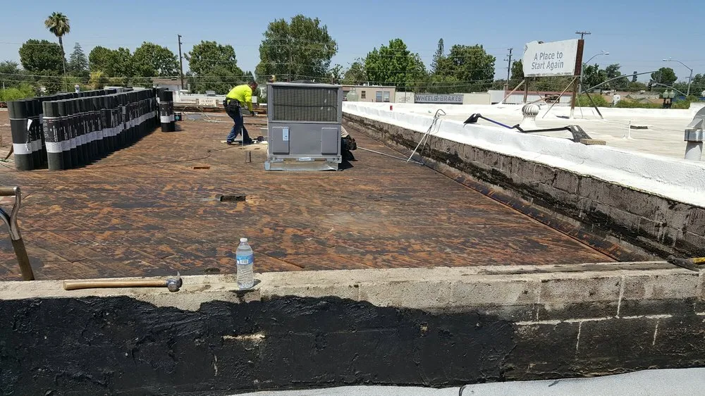 Slide of LAC Roofing