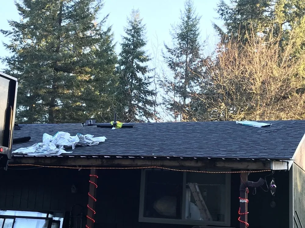 Slide of Lacey Roofing