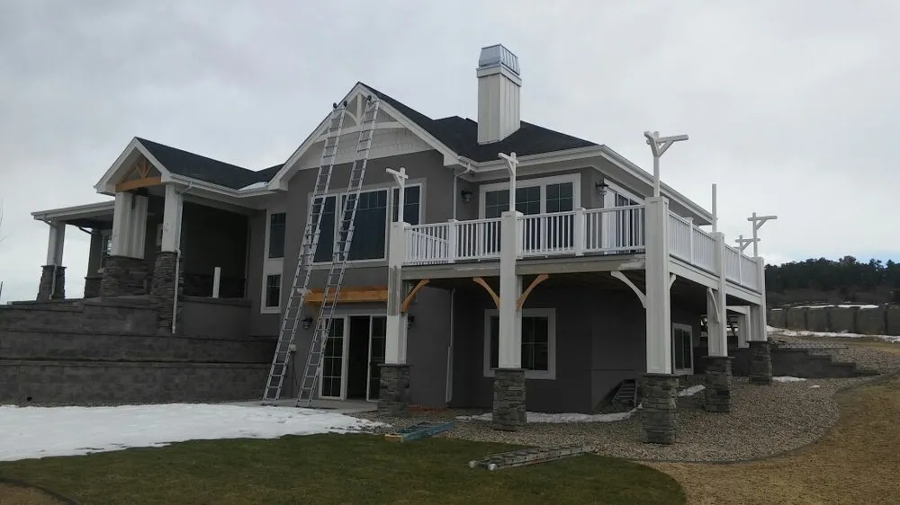 Local residential roofing service in Atlanta, MI by Lake Development Custom Homes