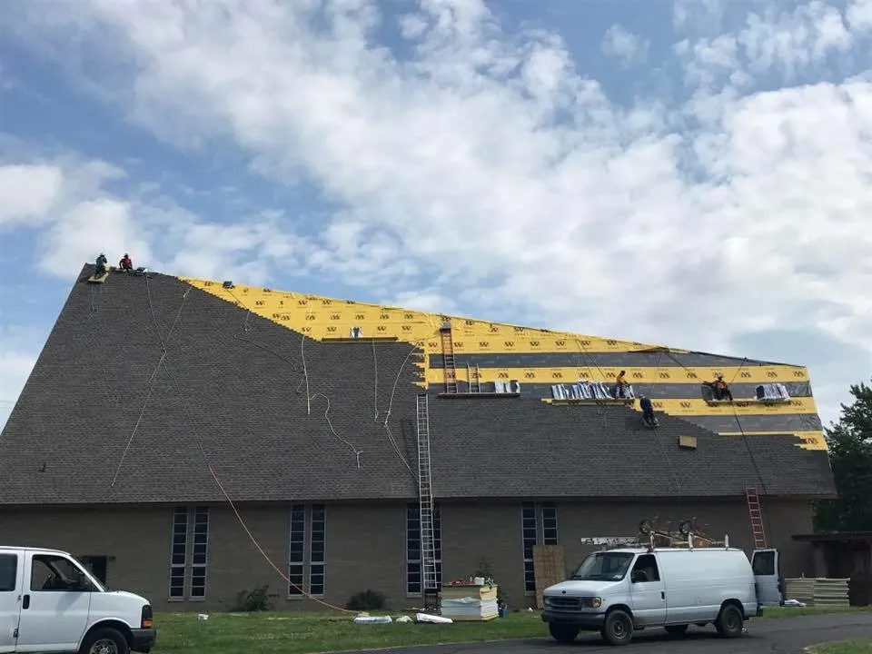 Slide of Lake Michigan Construction & Roofing