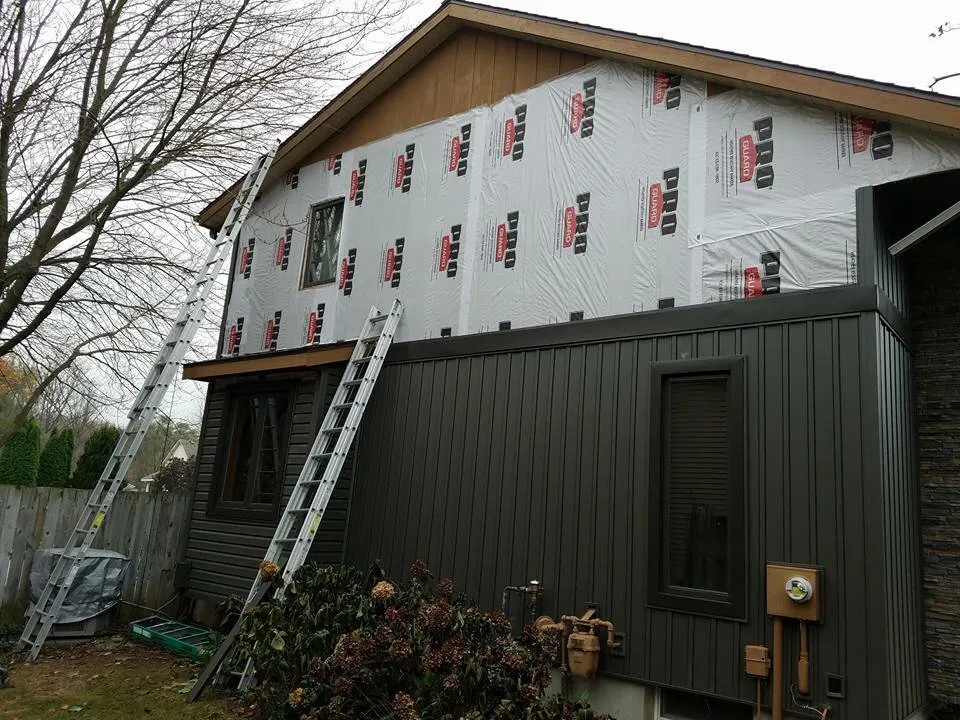 Slide of Lake Michigan Construction & Roofing