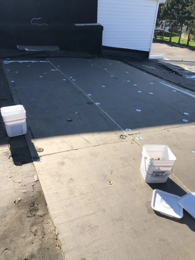 Local roof replacement after storm damage in Lawrence, MI by Lakeside Commercial Roofing