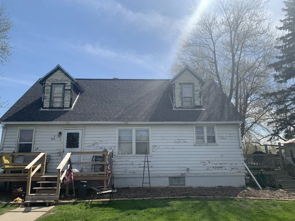 Licensed storm damage roof repair same-day service in Lawrence, MI by Lakeside Renovations
