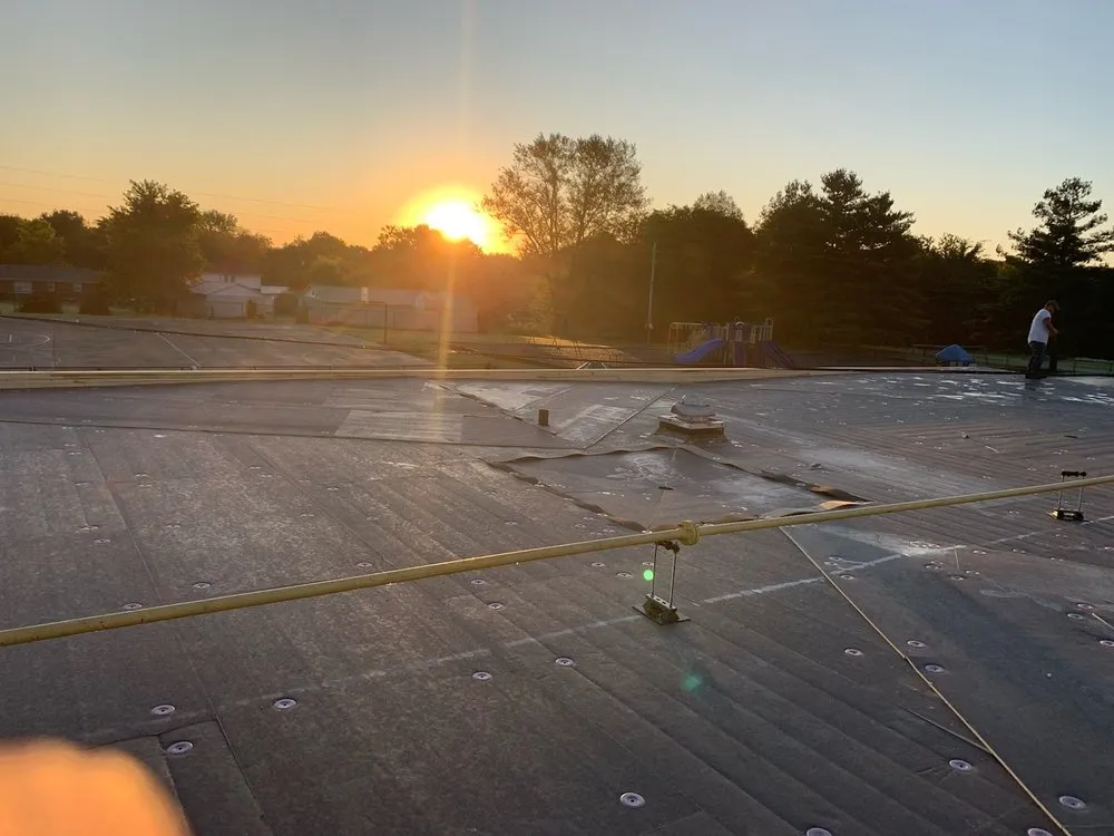 Slide of Lambert Roofing Company