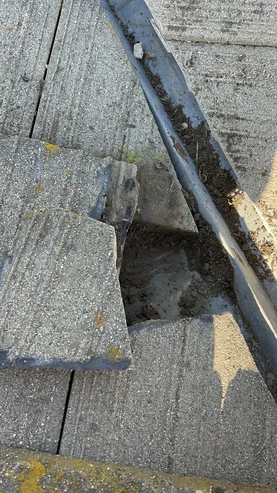 Slide of Lambert Roofing