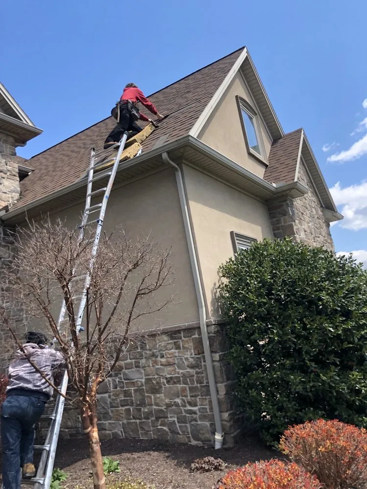 Slide of Lancaster Roofing Company