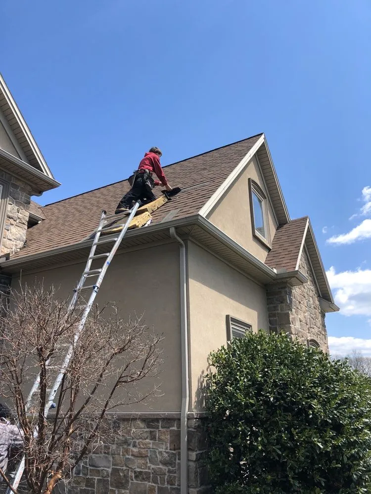 Slide of Lancaster Roofing Company