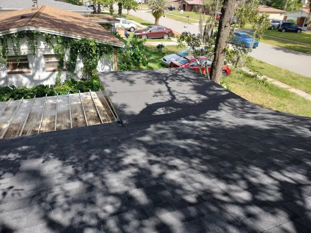 Slide of Land Roofing Company