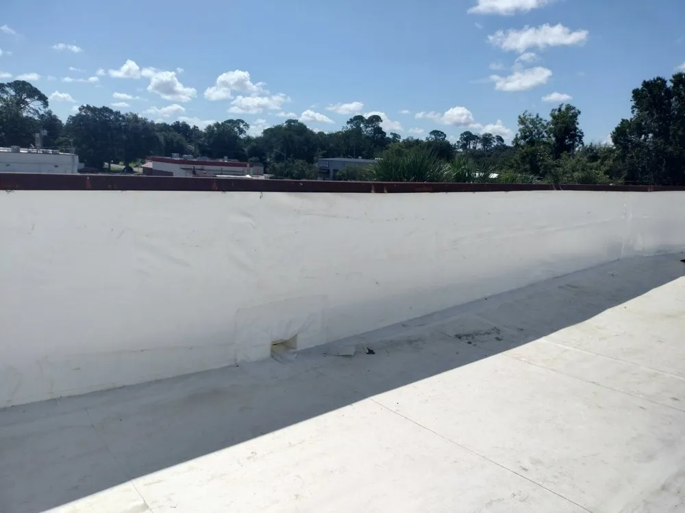 Slide of Land Roofing Company