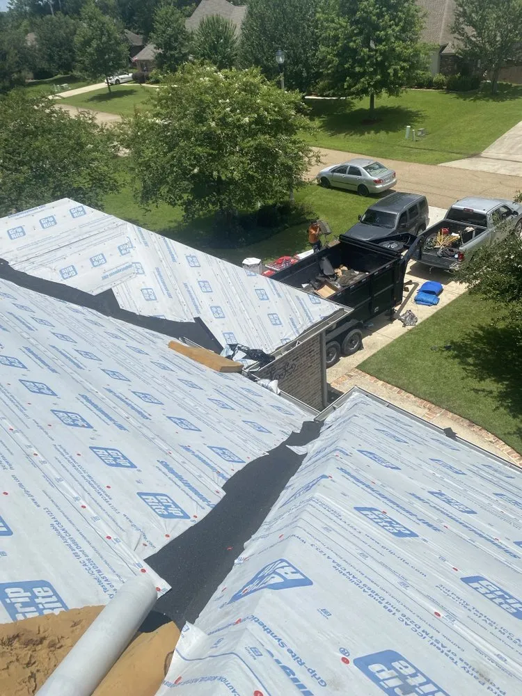 Slide of Land To Land Roofers