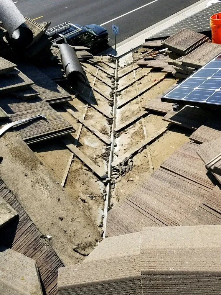 Slide of Landeros Roofing Solutions