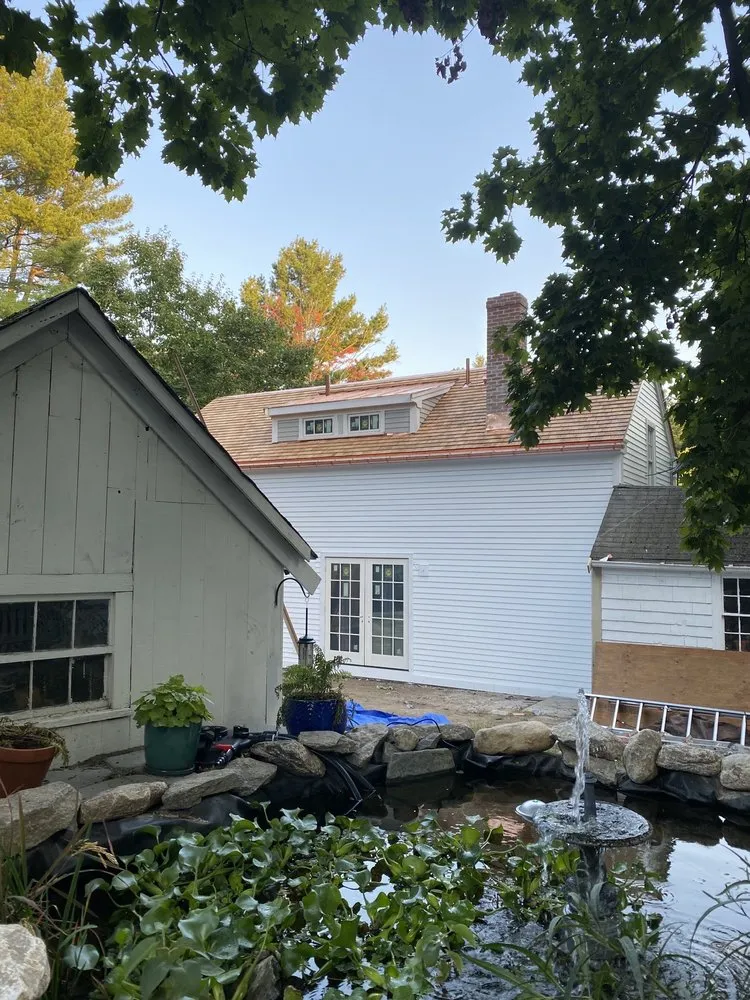 Slide of Landmark Roofing