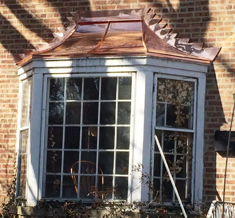 Slide of Landmark Roofing