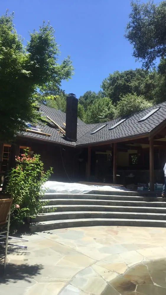 Slide of Landmark Roofing