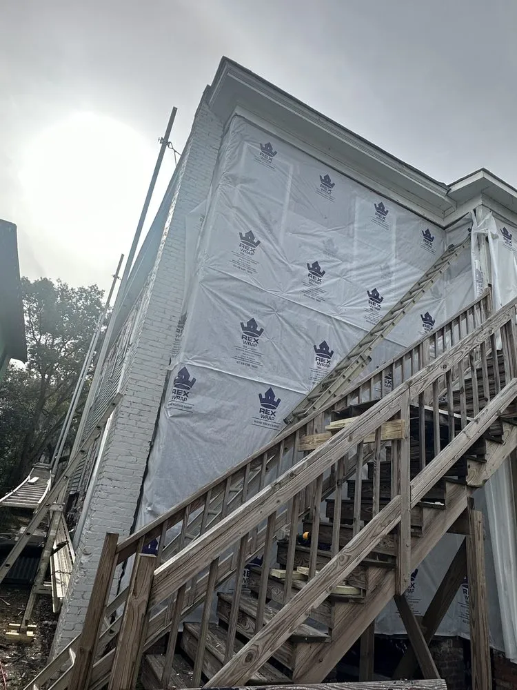 Slide of Landmark Roofing