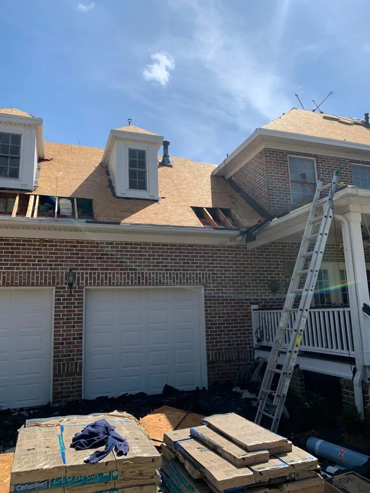 Slide of LandShark Roofing